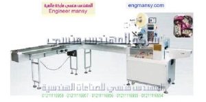 ماكينه تعبئة وتغليف البسكويت الويفر والكيك والحلويات فك رباعي